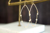 Glide earrings - pearl hoops
