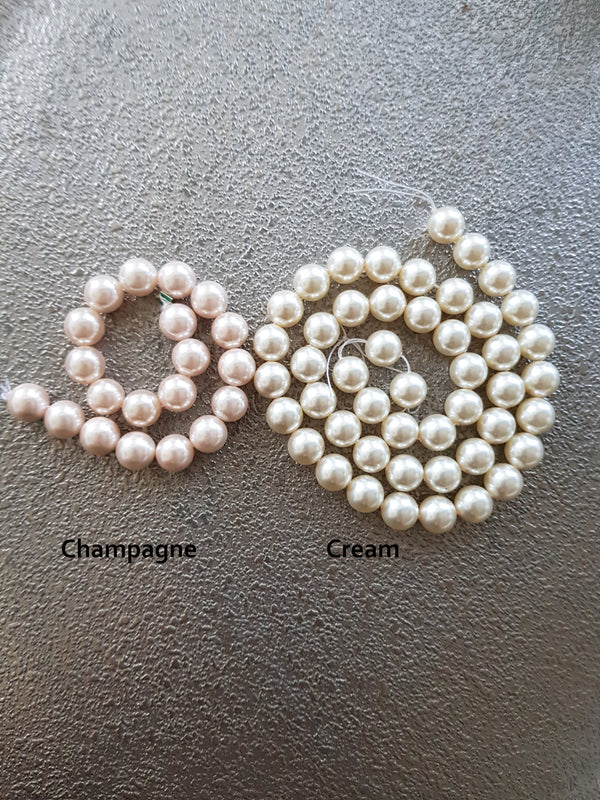 Linear pearl earrings - cream/blush